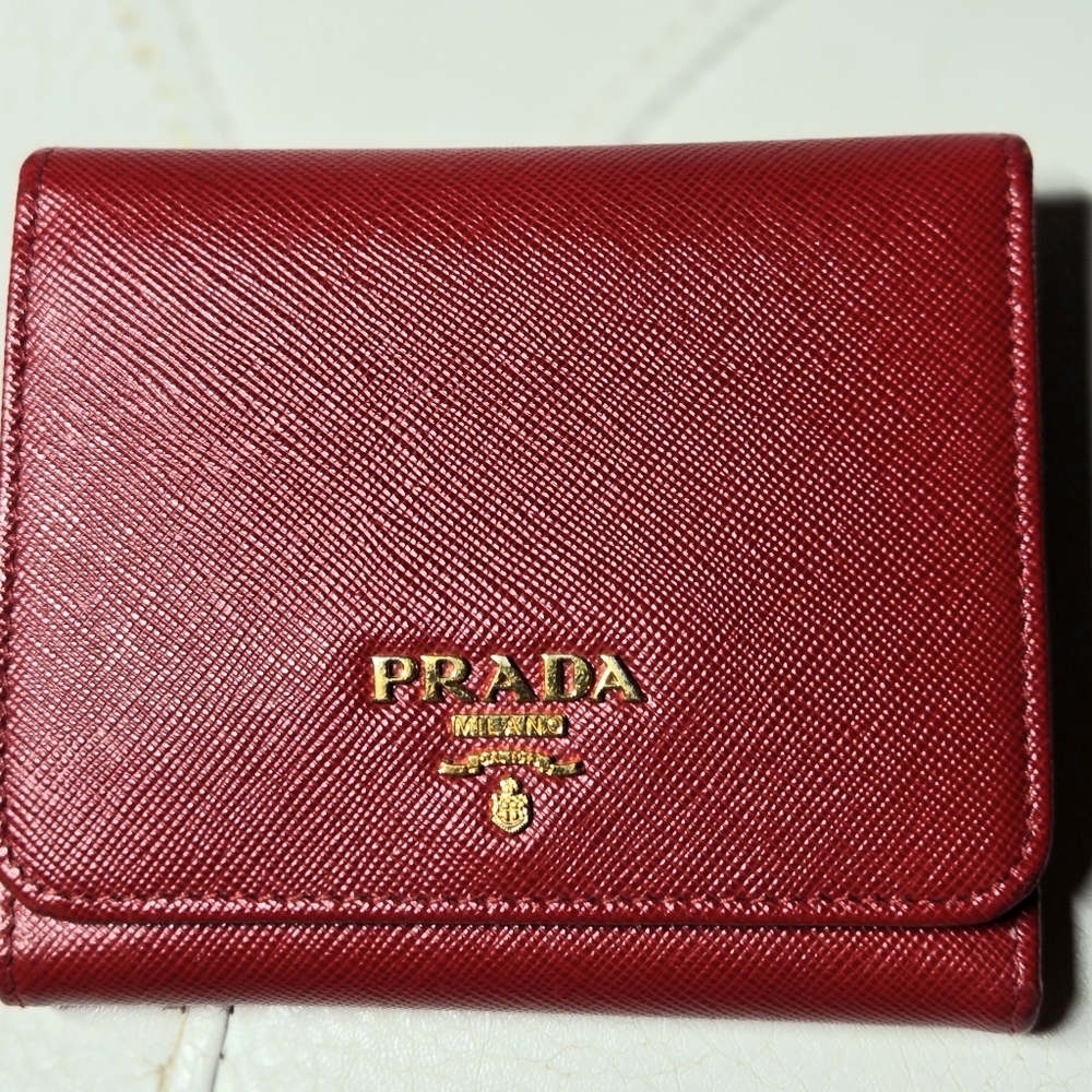 Prada Saffiano leather wallet in red. 